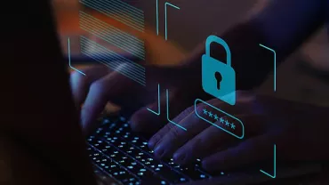 Hands typing on a keyboard with a digital security lock overlay.