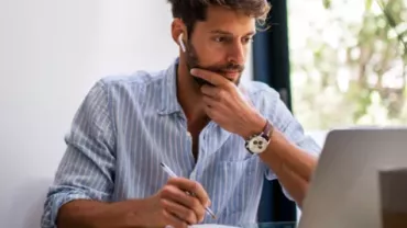 Man looking at computer screen