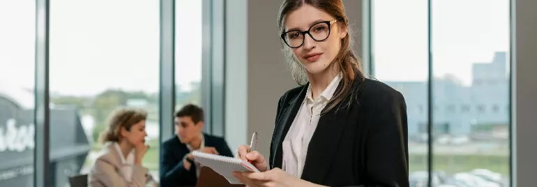 People in corporate wear in an office setting