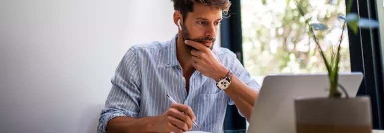 Man looking at computer screen